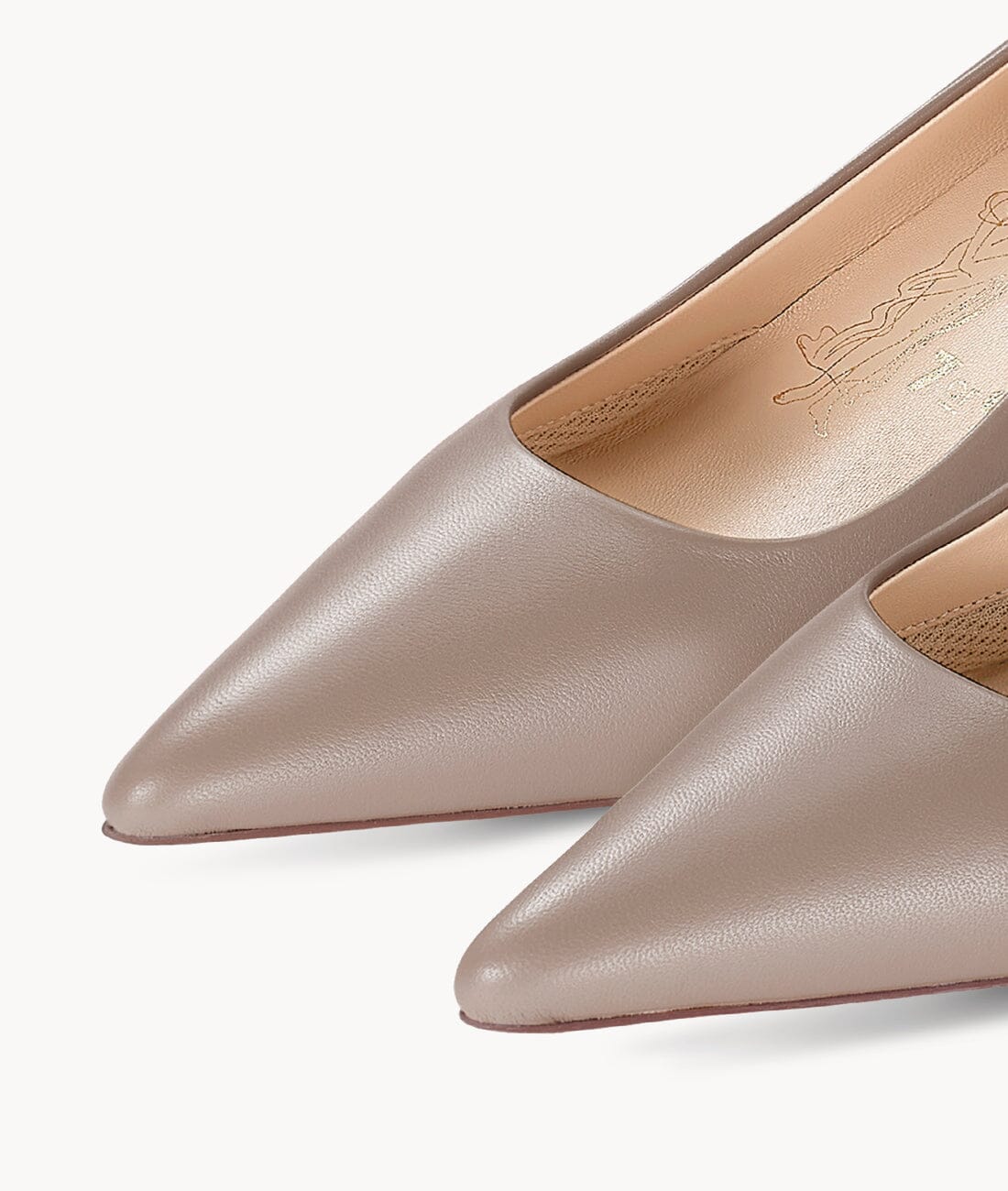 Nude close toed point toe heels